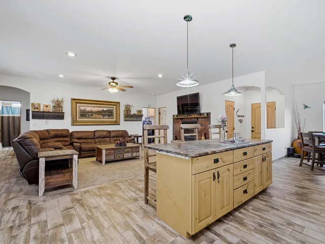 a view of kitchen center island and living room view