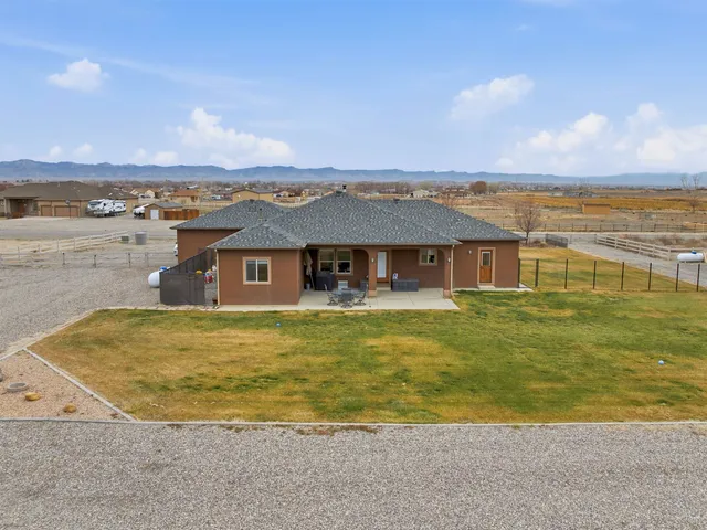 a view of a house with a ocean view