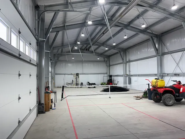 a utility room with lots of cars parked