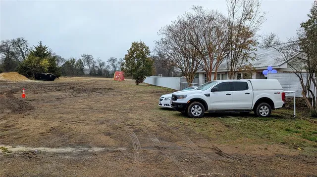 a view of a cars parked in a parking lot