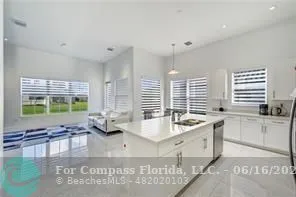 a bedroom with a bed and a lounge chair