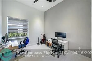 a view of a workspace with furniture