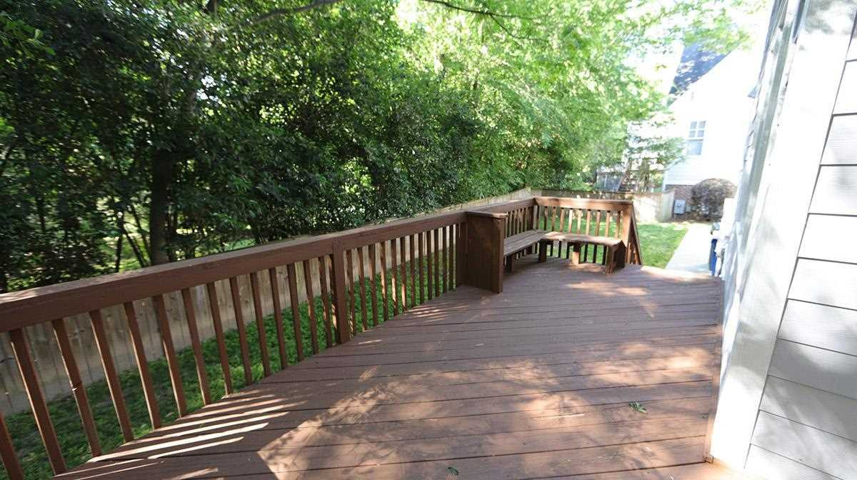 124 Village Mill Place Raleigh, NC 27608 - Photo 26 of 30 A 3rd option to enjoy the outdoors in this private and peaceful back yard. Deck