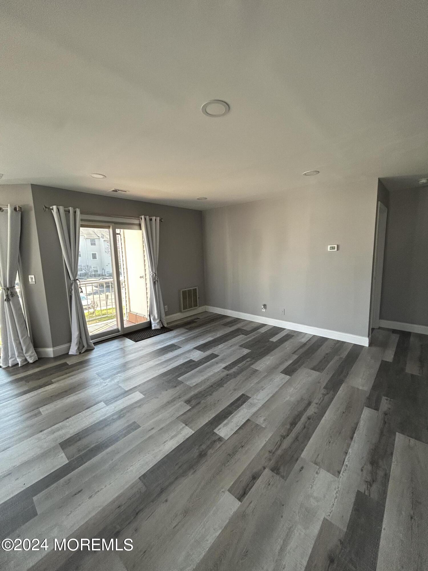 231 Atlantic Street, Unit 54 Keyport, NJ 07735 - Photo 1 of 12 72F16F4B-6A4B-4D5A-AABF-EB463C39D440