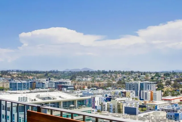 a kitchen with stainless steel appliances granite countertop a sink a stove and cabinets