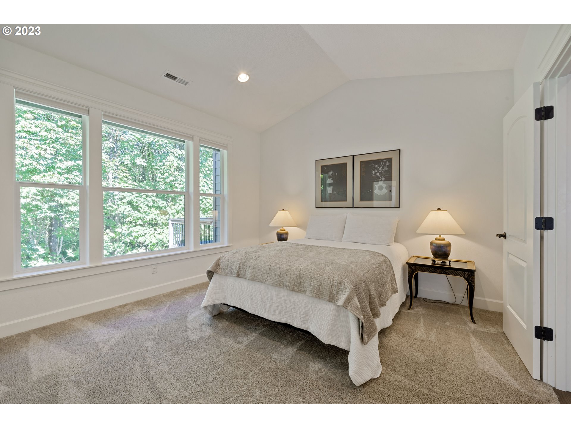 2514 South 19th Court Ridgefield, WA 98642 - Photo 15 of 34 a bed room with a bed and a night stand