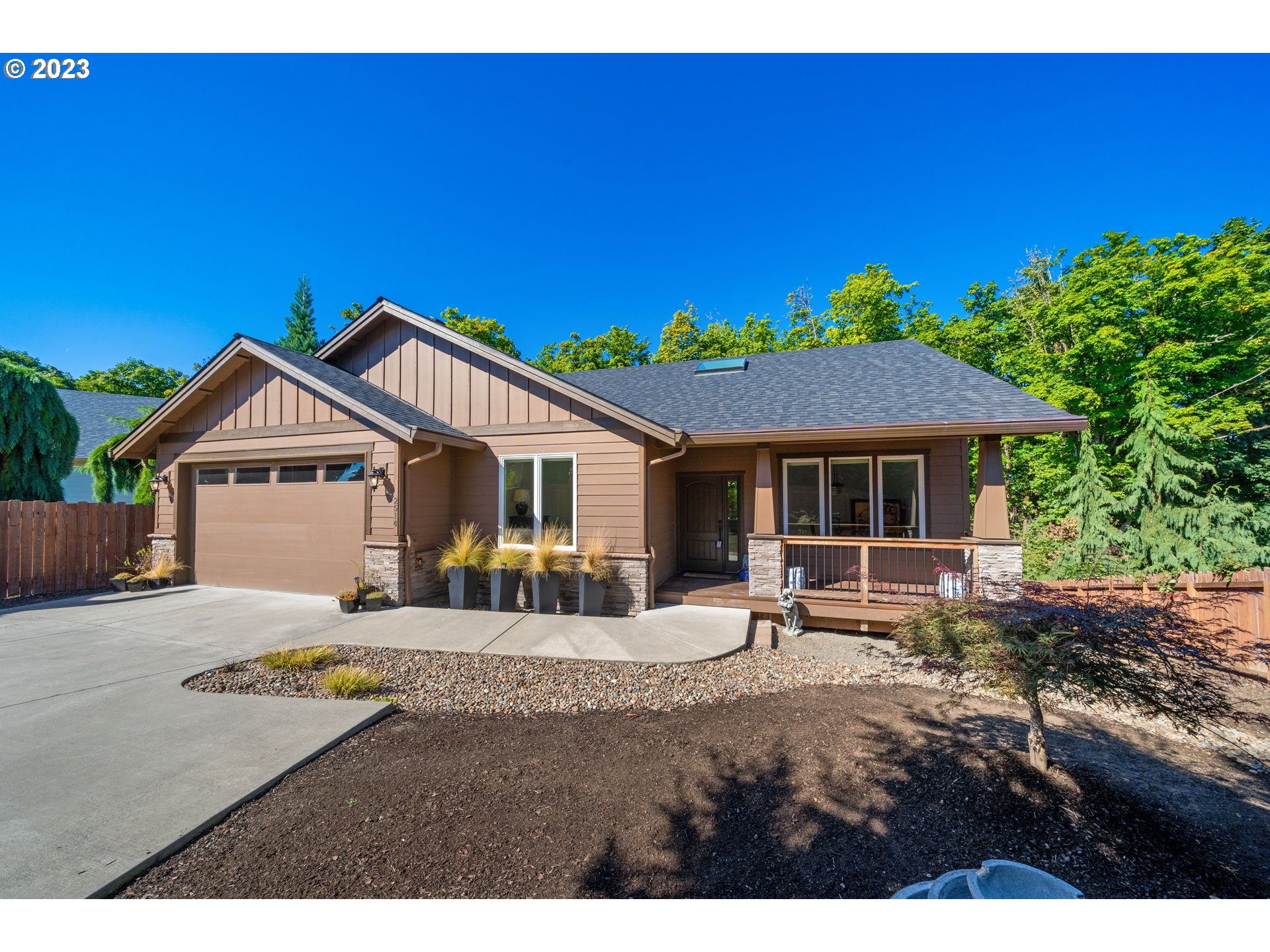 2514 South 19th Court Ridgefield, WA 98642 - Photo 2 of 34 a front view of a house with a patio
