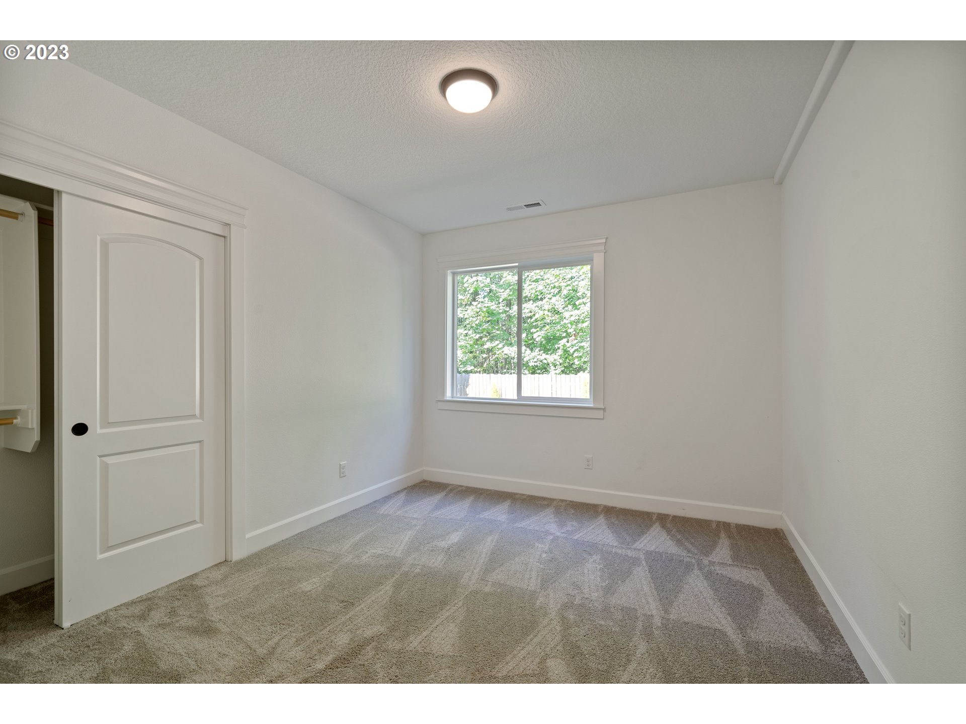 2514 South 19th Court Ridgefield, WA 98642 - Photo 25 of 34 a view of an empty room with a window