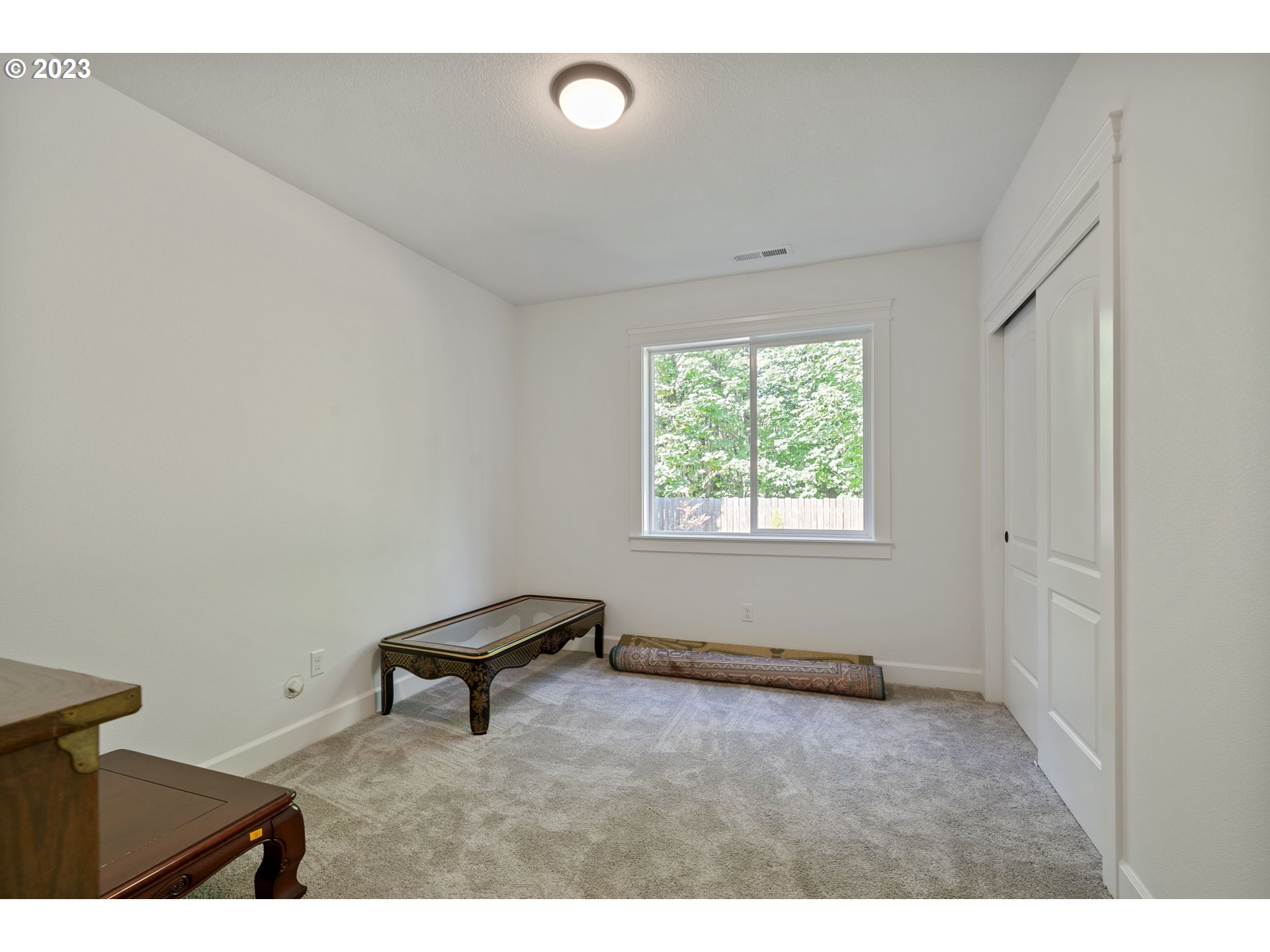 2514 South 19th Court Ridgefield, WA 98642 - Photo 26 of 34 a view of a room with gym equipment and a window