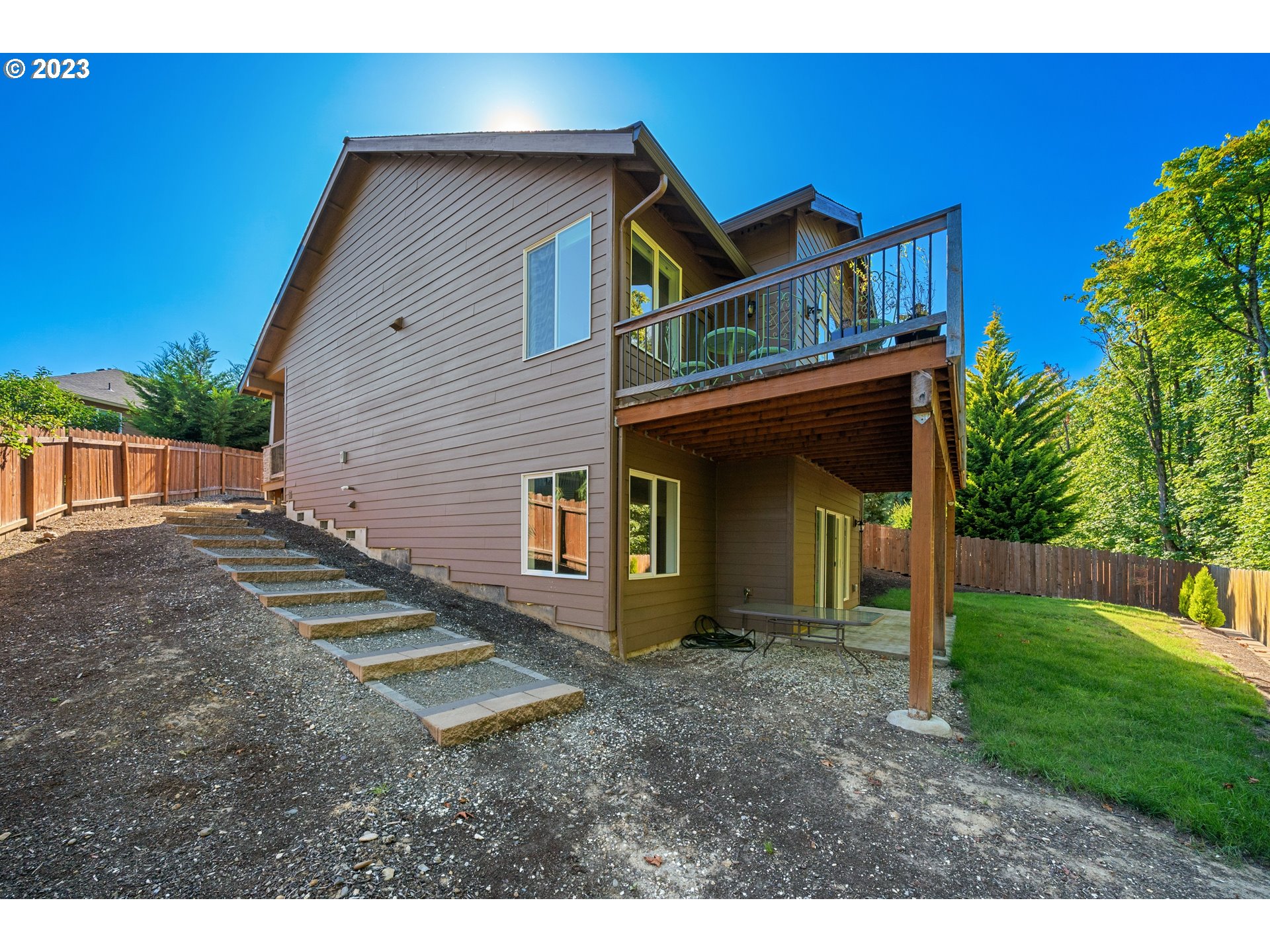 2514 South 19th Court Ridgefield, WA 98642 - Photo 32 of 34 a view of an house with backyard space and garden