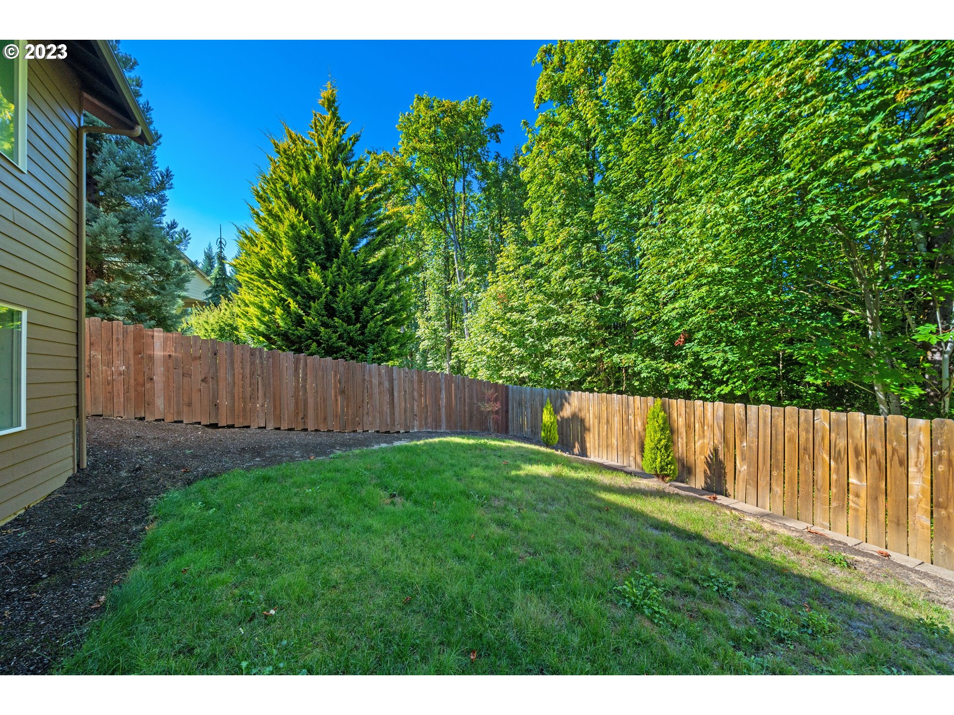 2514 South 19th Court Ridgefield, WA 98642 - Photo 33 of 34 a view of a yard with an outdoor seating