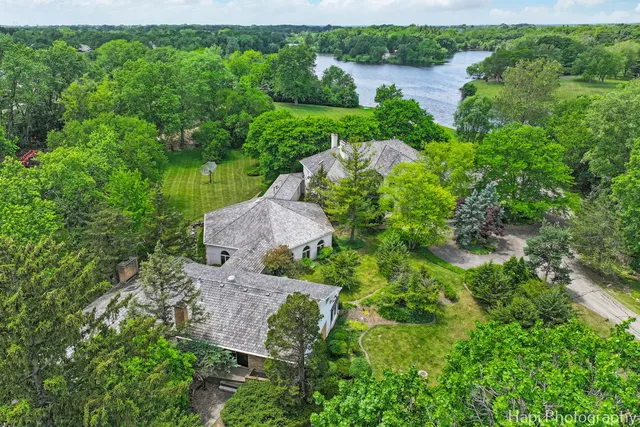 a view of a chairs and table in the patio