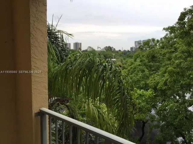 a bedroom with bed and a window