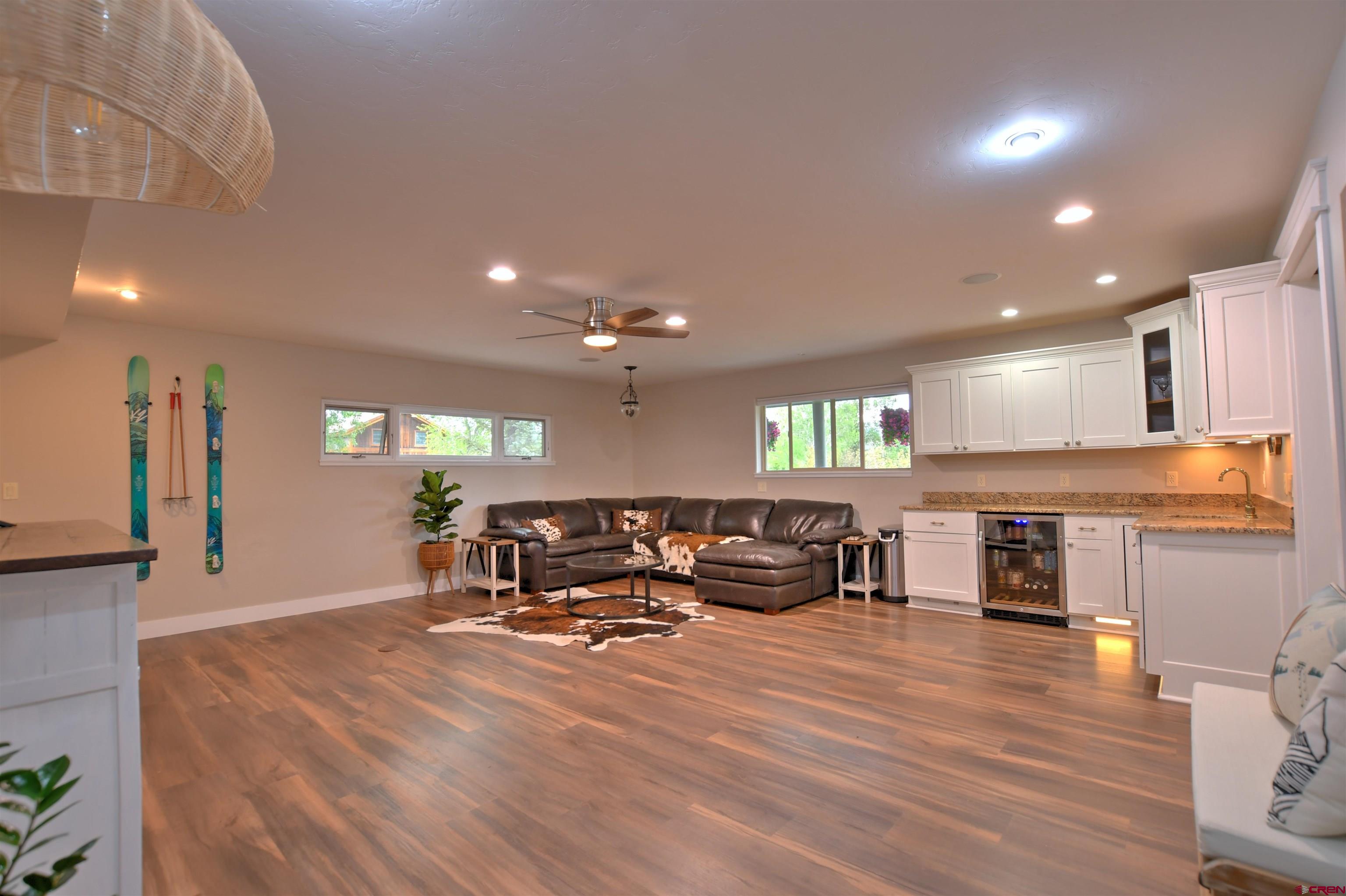 602 Chipeta Drive Ridgway, CO 81432 - Photo 9 of 41 a living room with stainless steel appliances furniture window and wooden floor