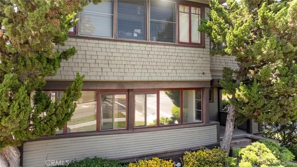a bathroom with a shower and a sink