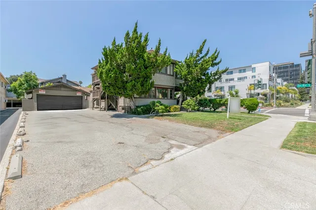 a kitchen that has a stove and a table in it