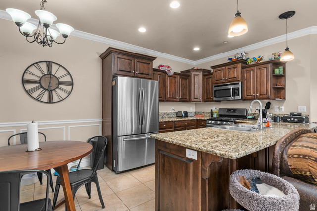 476 West 200 N Street, Unit 206 Springville, UT 84663 - Photo 6 of 24 Kitchen featuring dark wood finish cabinets, open shelves, stainless steel appliances, a peninsula, and suspended lighting