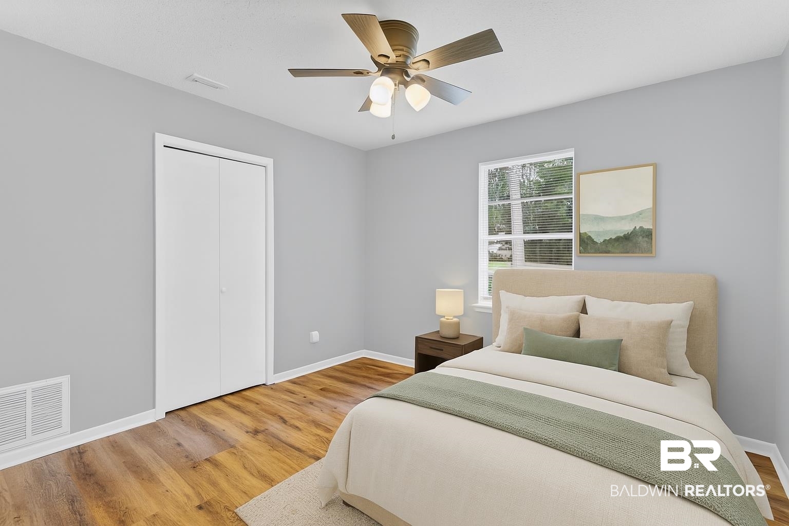 3304 Armond Drive Mobile, AL 36605 - Photo 36 of 62 Bedroom with wood finished floors, a ceiling fan, and a closet