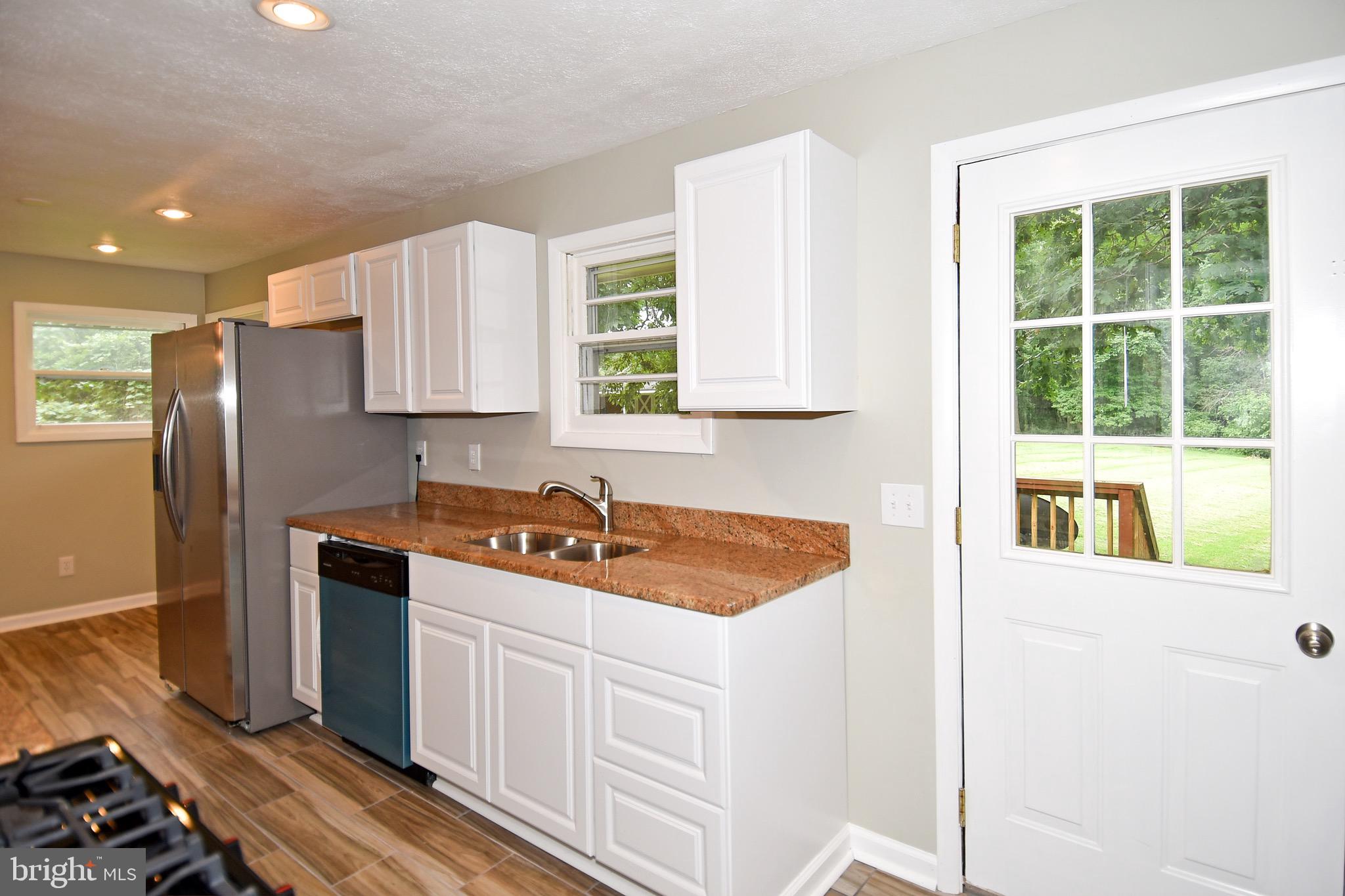 3615 Dumfries Road Catlett, VA 20119 - Photo 14 of 30 Kitchen opens to rear deck.