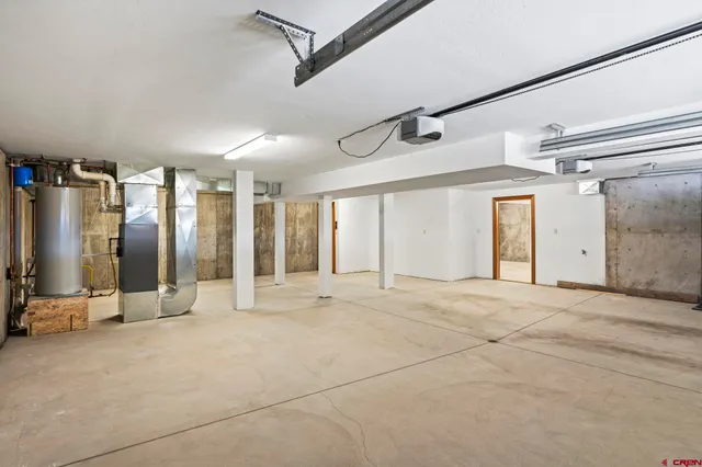 a view of an empty room with windows