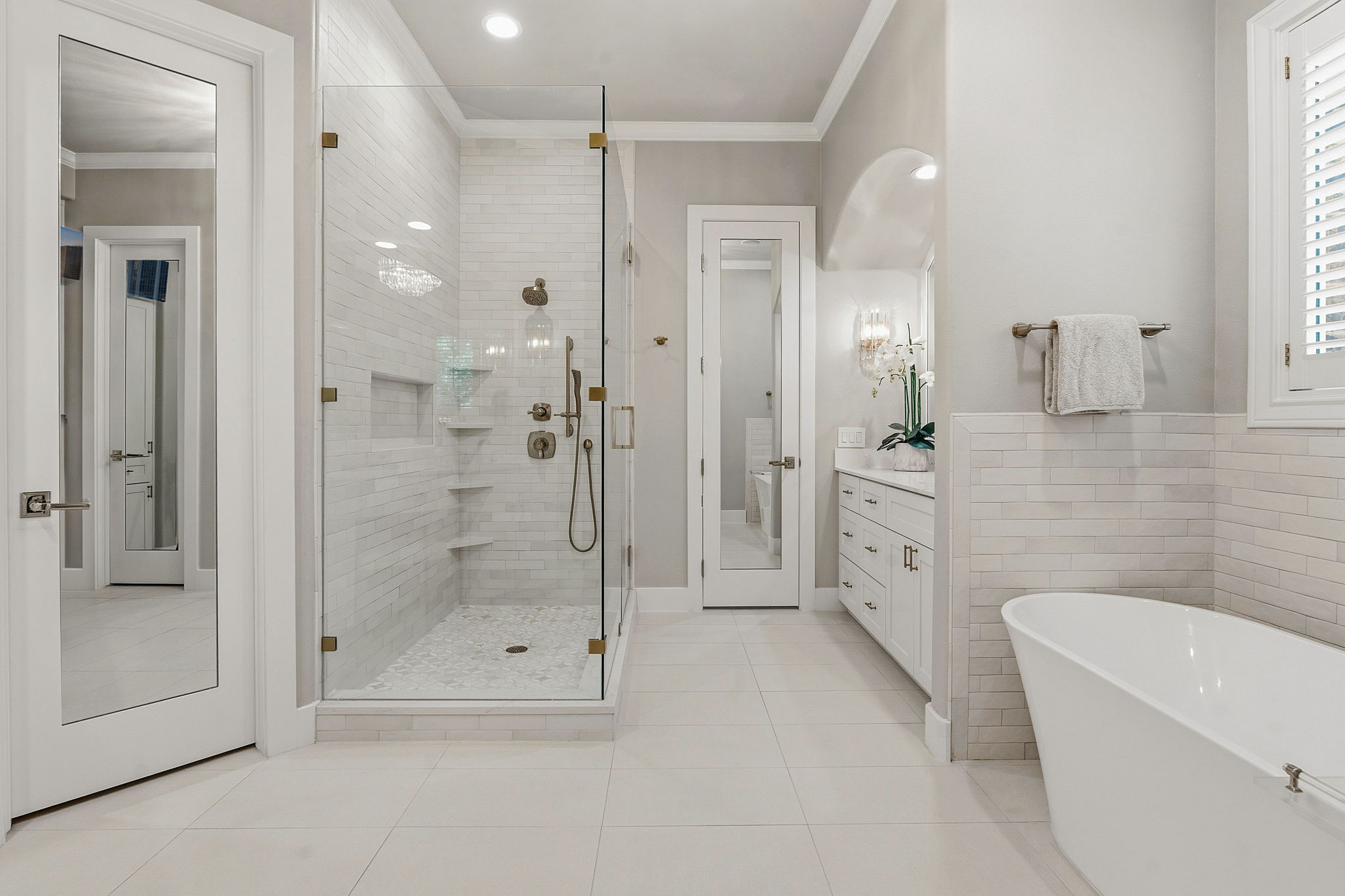 11501 Turtle Lane Austin, TX 78726 - Photo 19 of 37 a bathroom with a bathtub and a shower