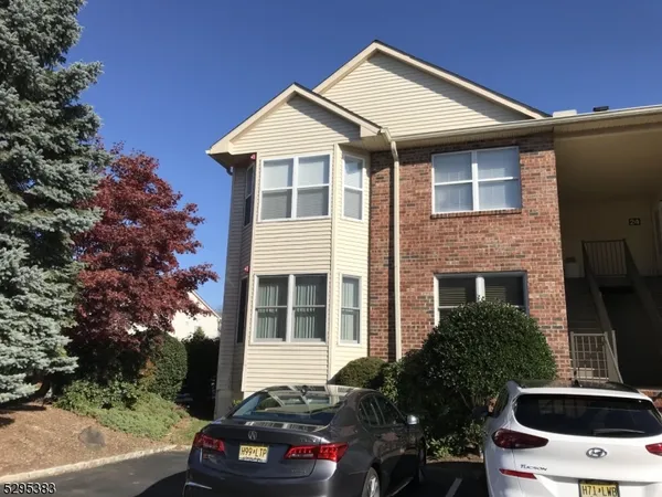 a car parked in front of a house