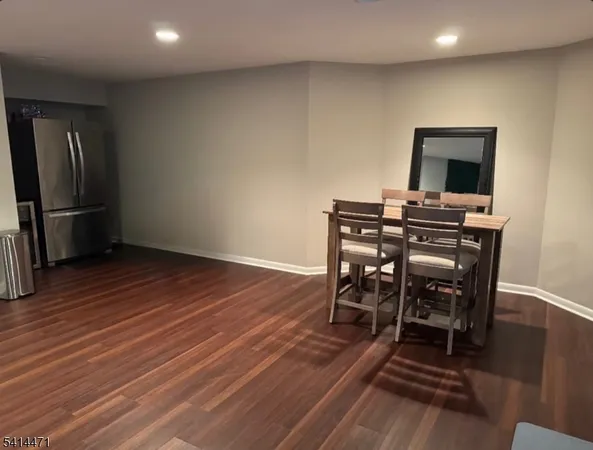 a view of a workspace with furniture