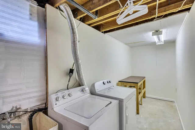a view of a house with wooden deck