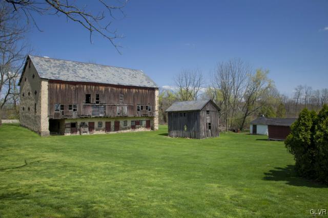 5123 Chapmans Road Orefield, PA 18069 - Photo 4 of 11 a front view of a house with a garden