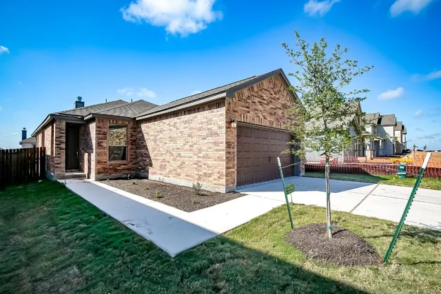 a house view with a garden space