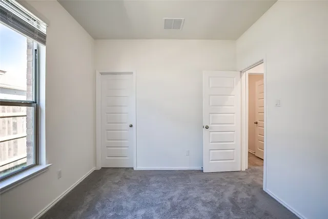 an empty room with closet