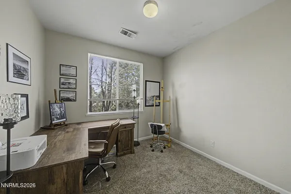a view of a hallway with workspace