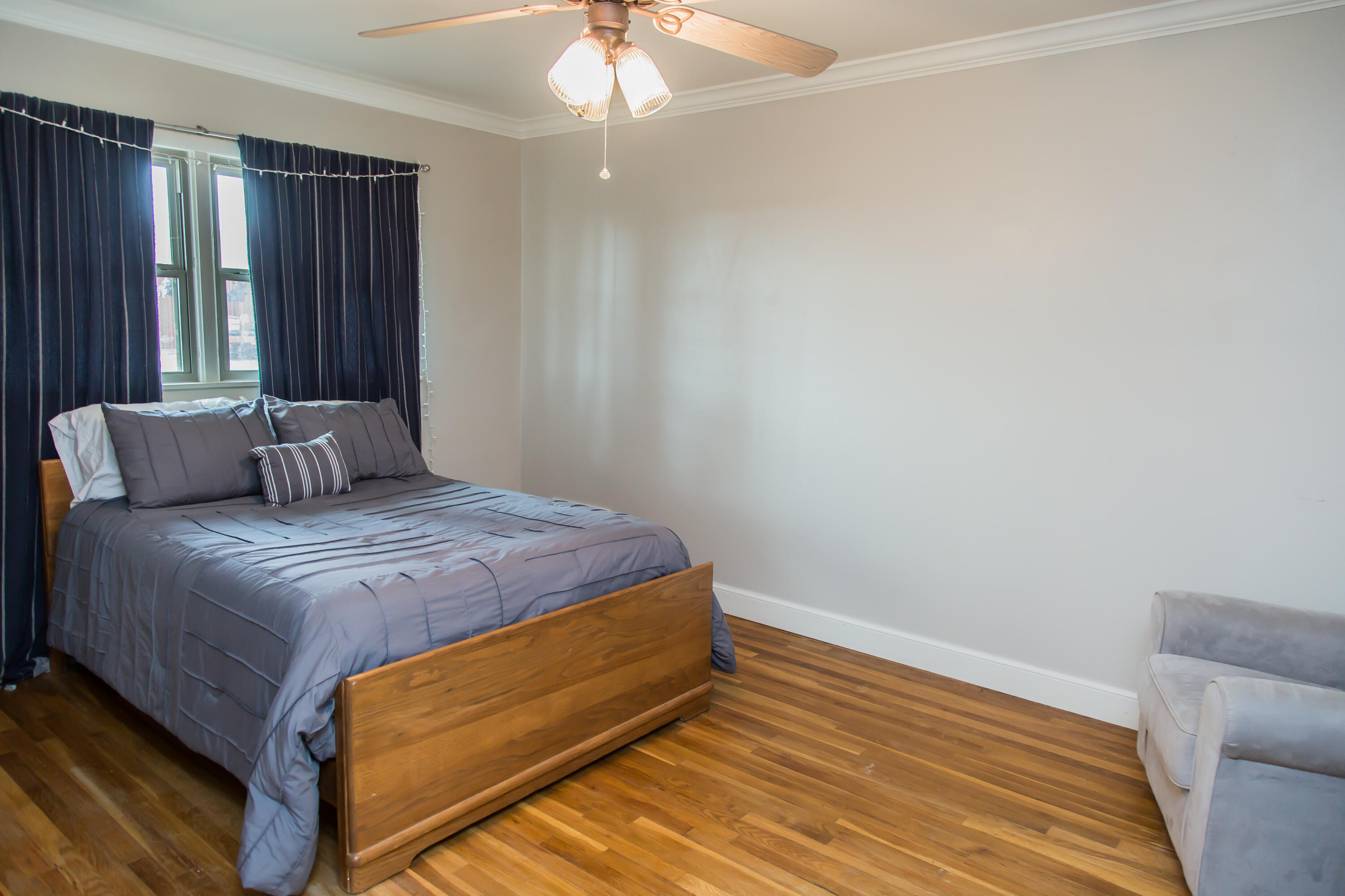 930 Sun Road Plainview, TX 79072 - Photo 14 of 22 a bedroom with a bed and a window