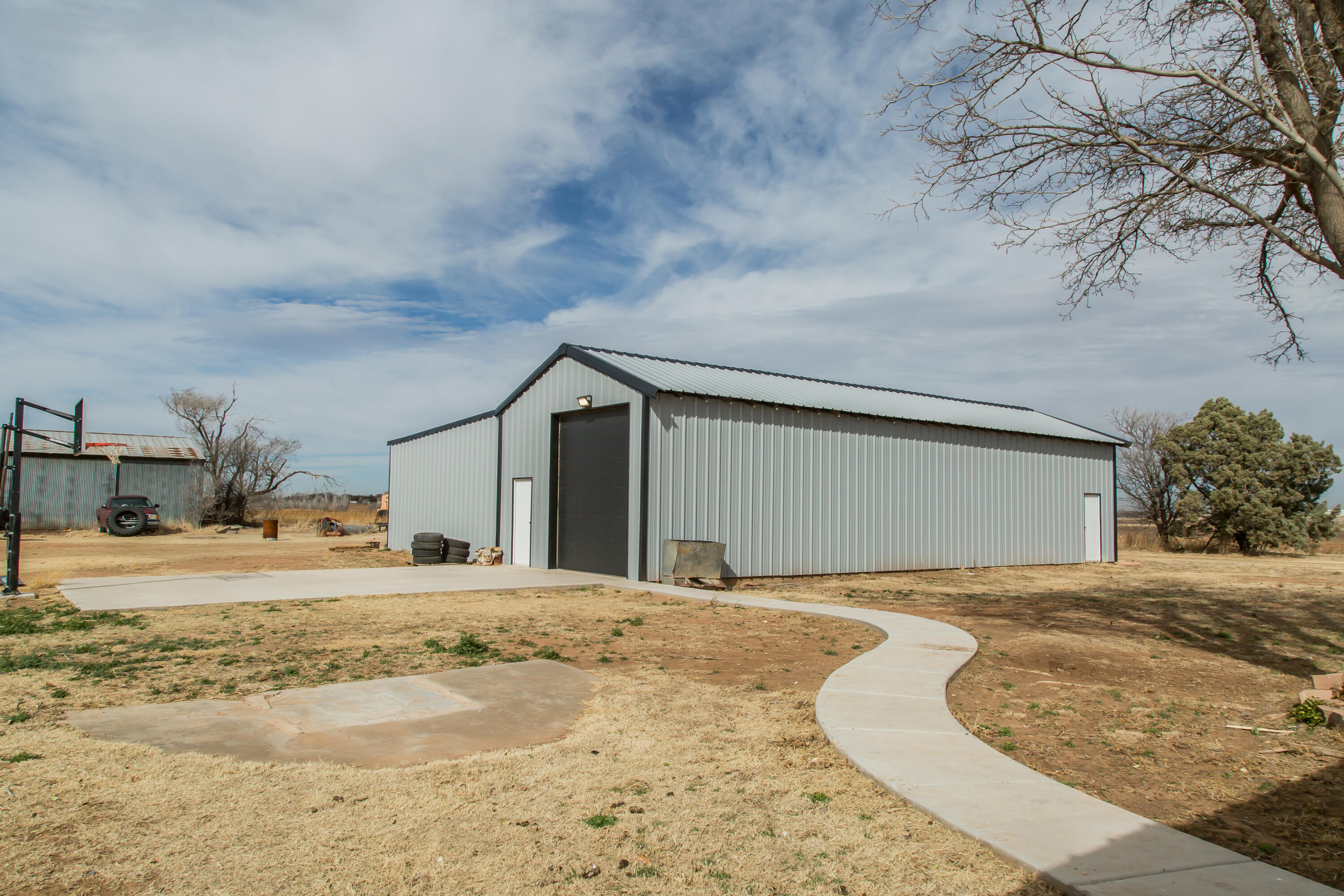 930 Sun Road Plainview, TX 79072 - Photo 20 of 22 a view of a house with snow on the road