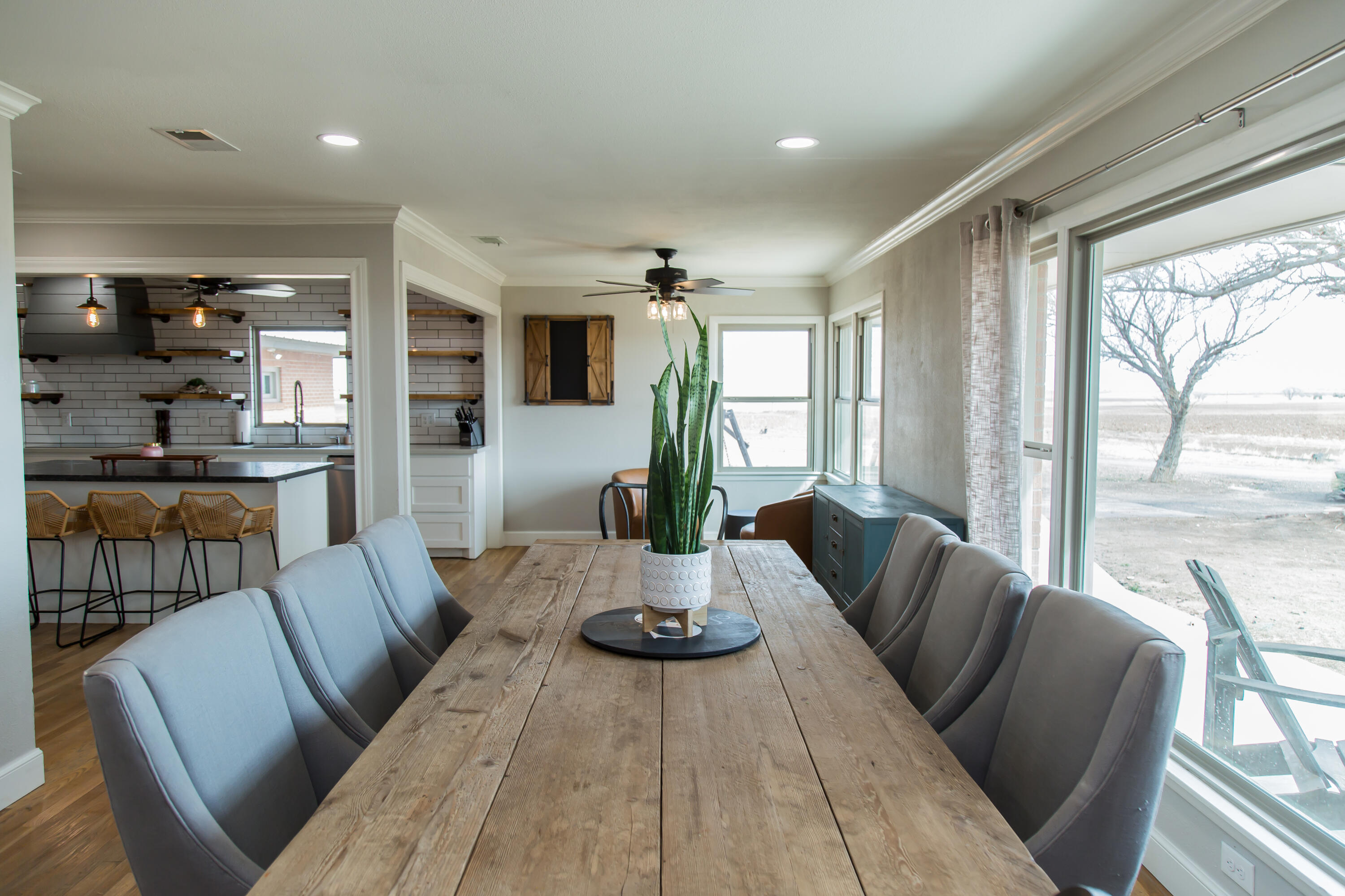 930 Sun Road Plainview, TX 79072 - Photo 8 of 22 a view of a dining room with furniture window and outside view