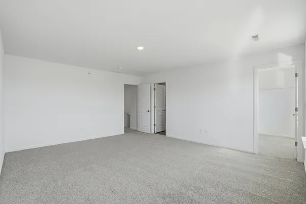 an empty room with an entryway