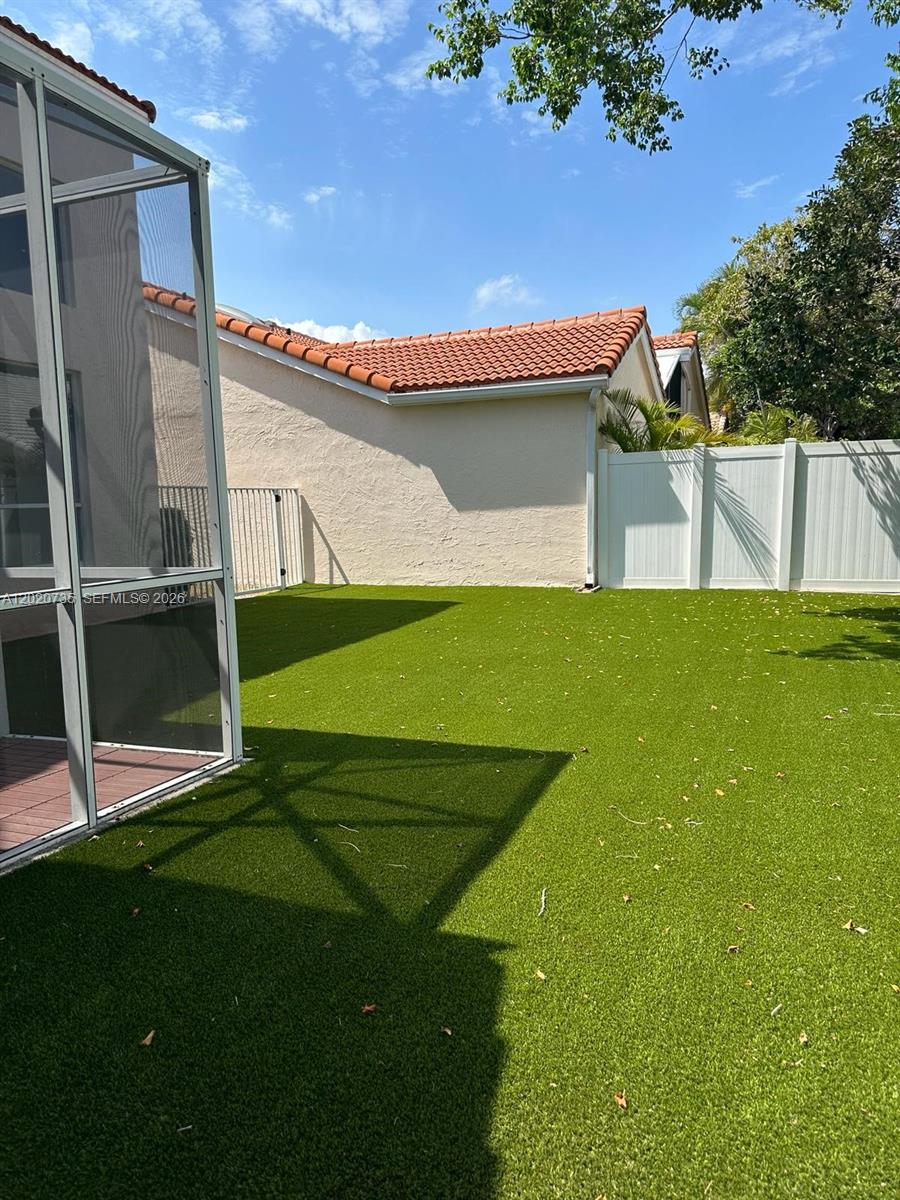 17244 Balboa Point Way Boca Raton, FL 33487 - Photo 26 of 66 a view of a backyard
