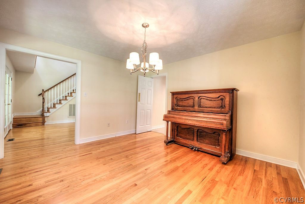 9217 Varina Road Henrico, VA 23231 - Photo 14 of 49 a view of livingroom with furniture and wooden floor