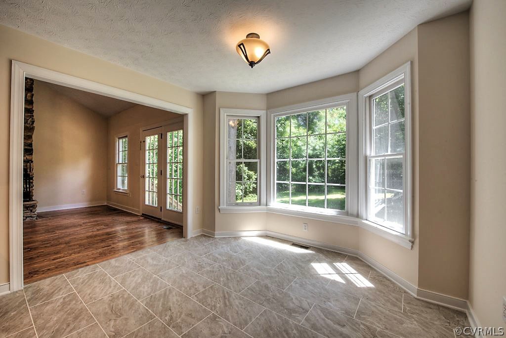 9217 Varina Road Henrico, VA 23231 - Photo 15 of 49 a view of an empty room with a window