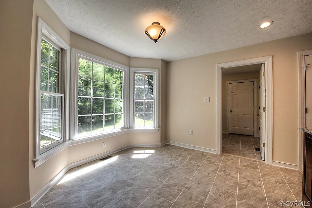 9217 Varina Road Henrico, VA 23231 - Photo 16 of 49 a view of an empty room with a window