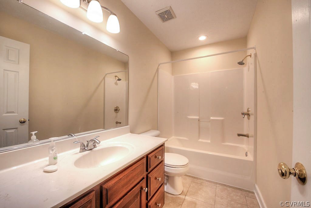 9217 Varina Road Henrico, VA 23231 - Photo 26 of 49 a bathroom with a sink mirror toilet and bathtub
