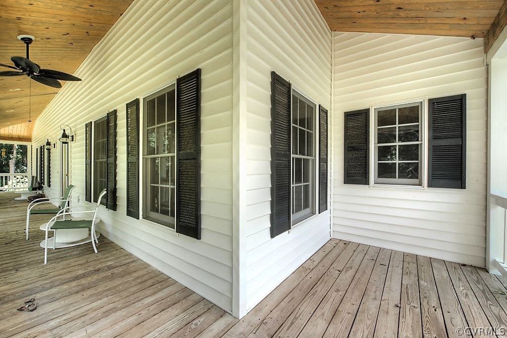 9217 Varina Road Henrico, VA 23231 - Photo 3 of 49 a view of a deck with wooden floor and floor to ceiling window