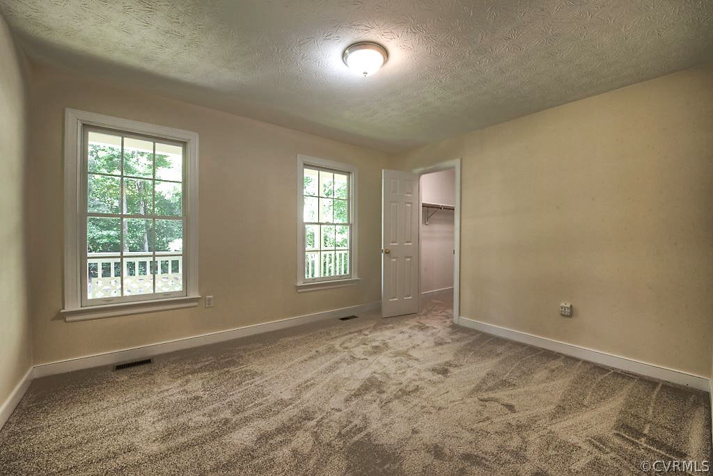 9217 Varina Road Henrico, VA 23231 - Photo 32 of 49 an empty room with windows