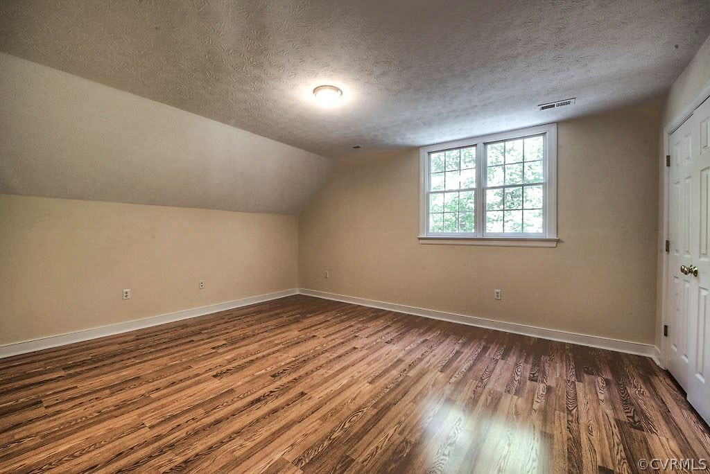 9217 Varina Road Henrico, VA 23231 - Photo 34 of 49 wooden floor in an empty room with a window