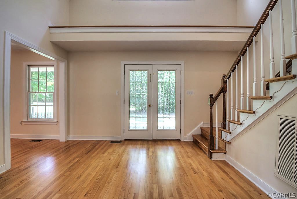 9217 Varina Road Henrico, VA 23231 - Photo 4 of 49 a view of empty room with wooden floor and fan