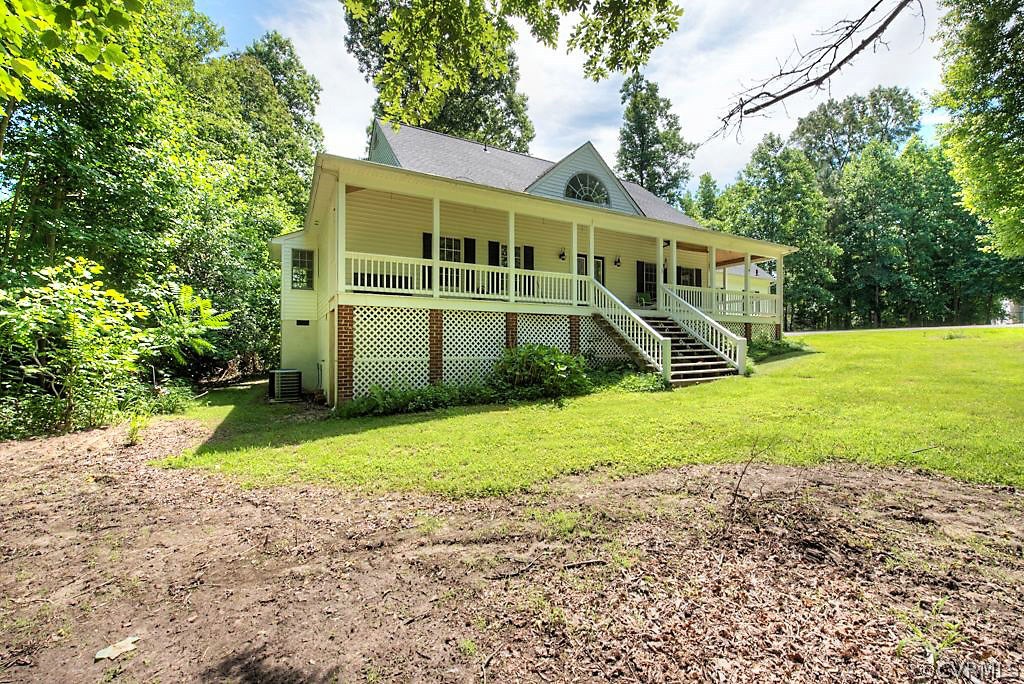 9217 Varina Road Henrico, VA 23231 - Photo 41 of 49 a view of a house with backyard and trees