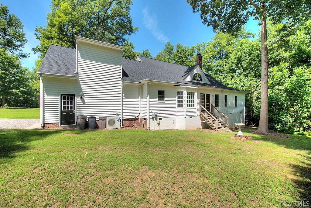 9217 Varina Road Henrico, VA 23231 - Photo 42 of 49 a front view of a house with a yard