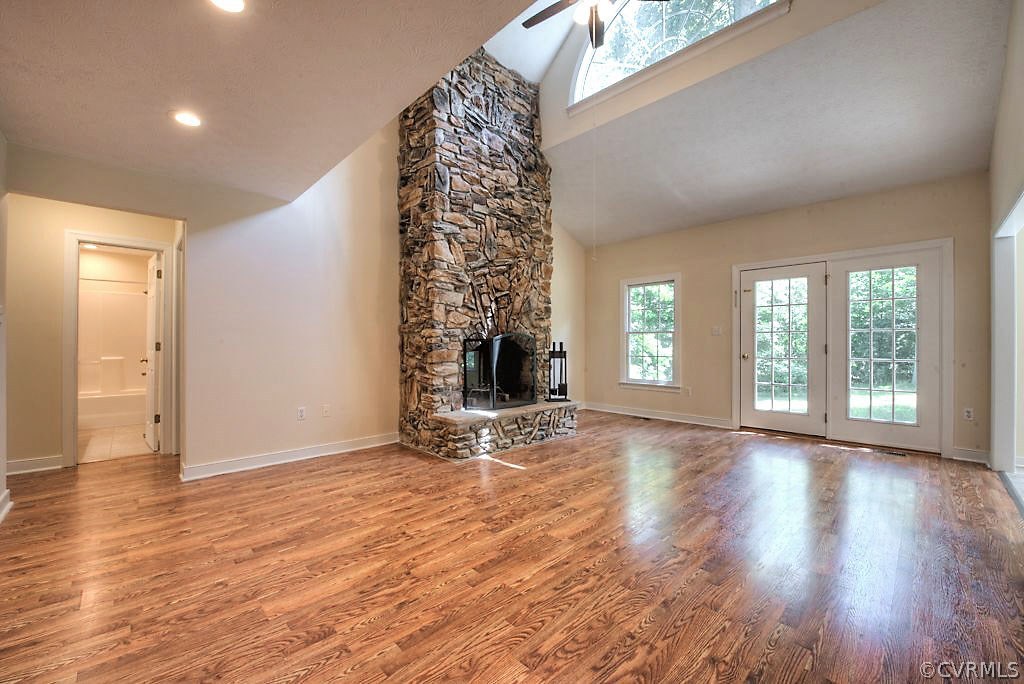 9217 Varina Road Henrico, VA 23231 - Photo 7 of 49 an empty room with wooden floor and windows
