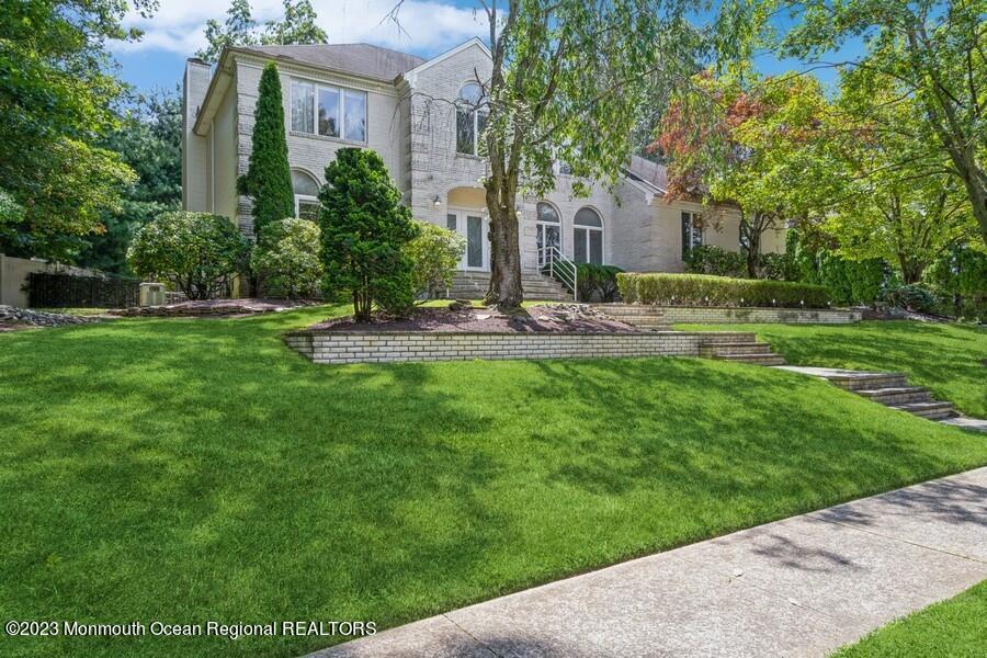 30 Chagall Road Marlboro, NJ 07746 - Photo 2 of 26 a view of a patio with a yard