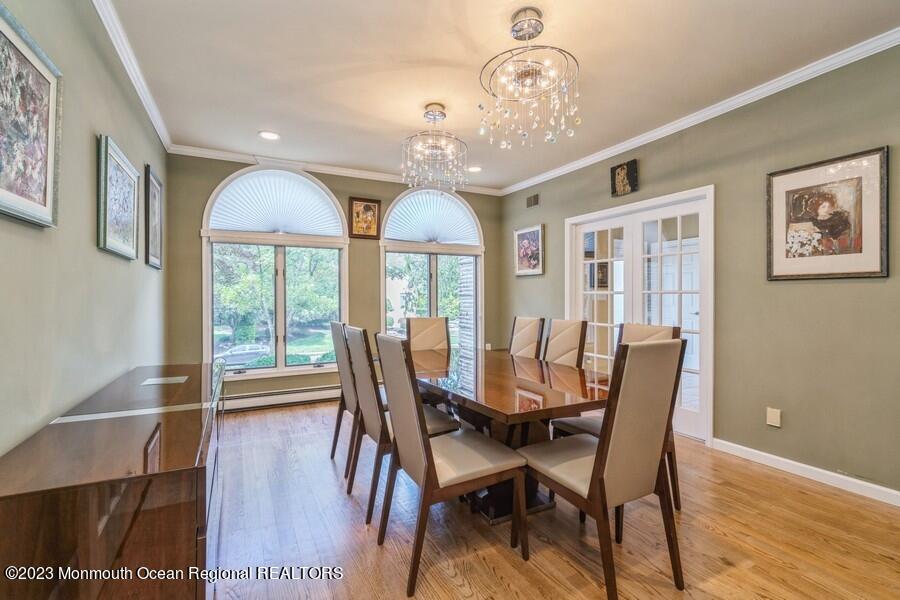30 Chagall Road Marlboro, NJ 07746 - Photo 7 of 26 a view of a dining room with furniture window and wooden floor